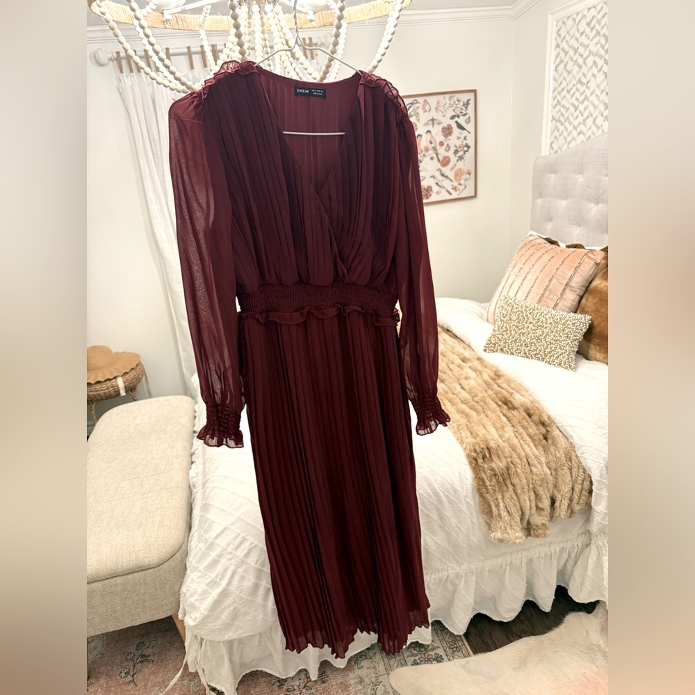 burgundy pleated dress with ruffles